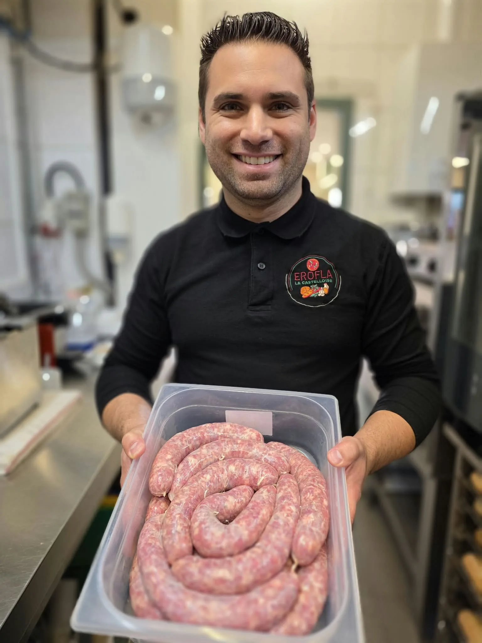 Eros preparing our homemade Italian sausages, at the Casteau shop.