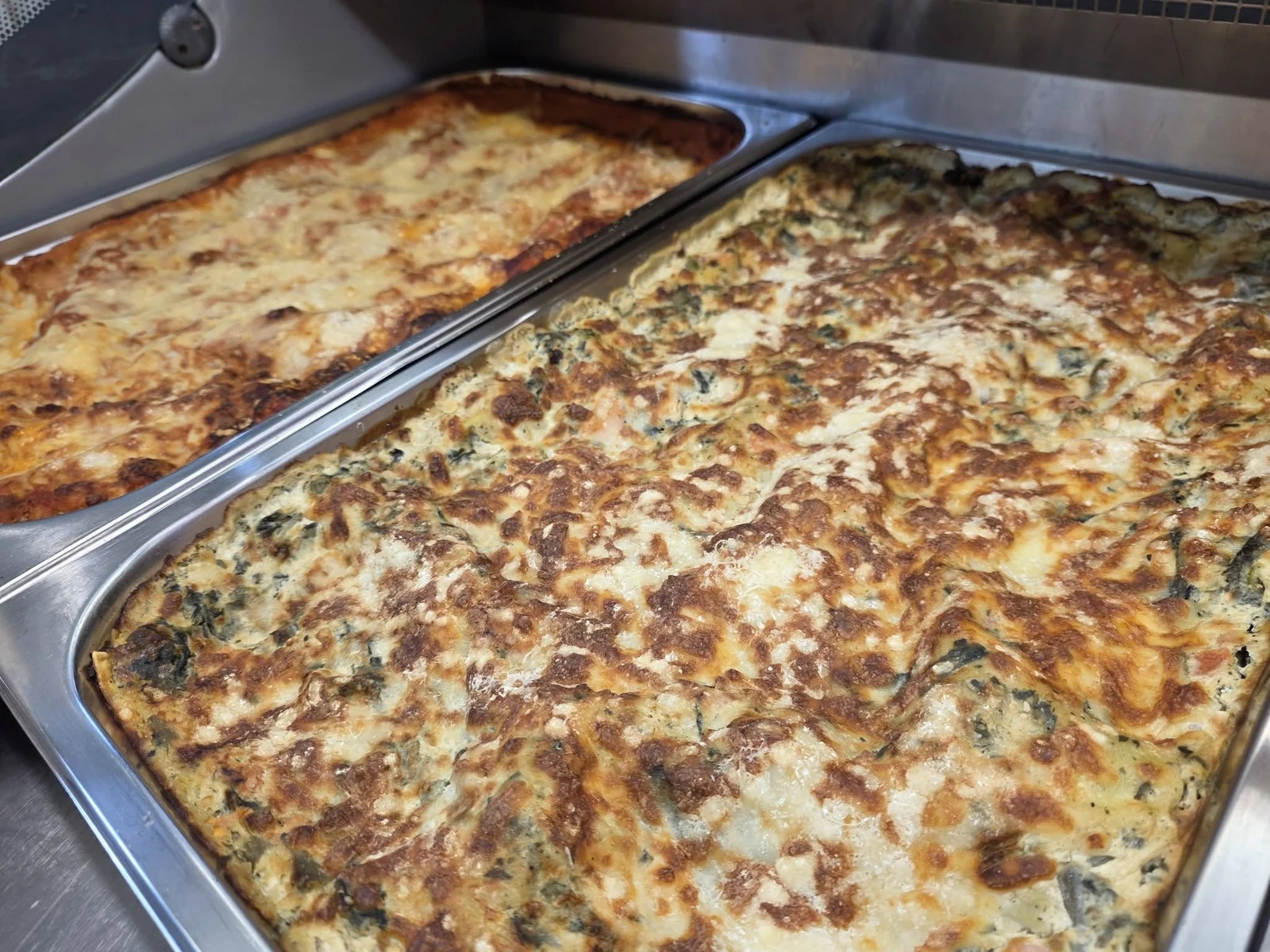 Plats gratinés préparés chez Erofla.